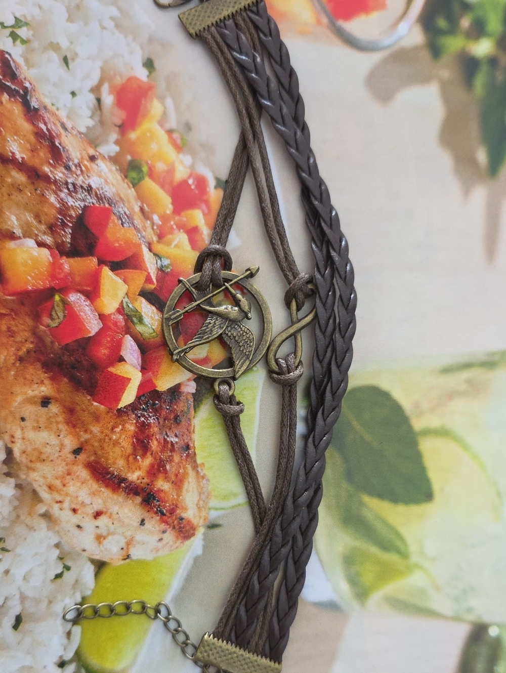 multi-strand unisex bracelet themed around The Hunger Games